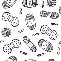 Illustration of yarn, clews and stitch markers. Vector seamless pattern, black ink on white background. Great for fabric, wrapping papers, wallpapers, covers.  Knitting hobby in doodle outline.