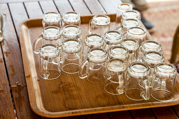 tray with empty glass cups