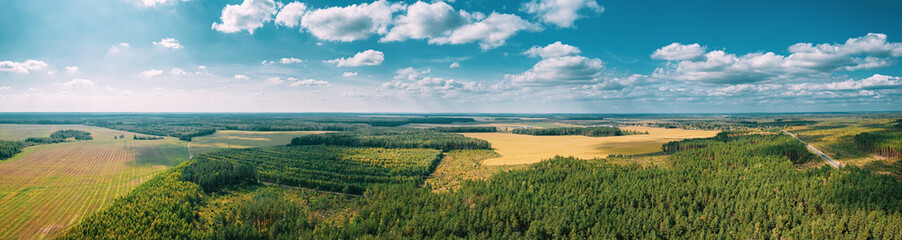 Aerial View Of Agricultural Landscape With Fields And Forest In Spring Season. Beautiful Rural Landscape In Bird's-eye View © Great Brut Here