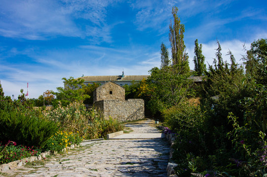 Orthodox Church is Church of Iverskaya Our Lady or Armenian Church as Church of John Baptist. Temple of early 14th century. Сurrent temple. Feodosia, Crimea, Russia, September, 2019: 
