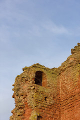 Detail of the internal structure of the Red Castle Keep at Lunan Bay, showing an Arched recess within the sandstone stonework of its construction.