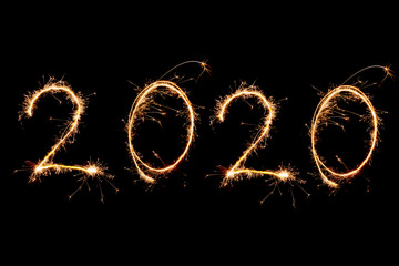 2020 written with Sparkle firework on black background, happy new year 2020 concept