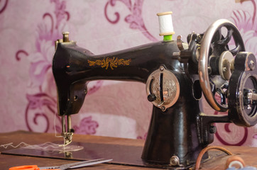 Old vintage sewing machine close up, work