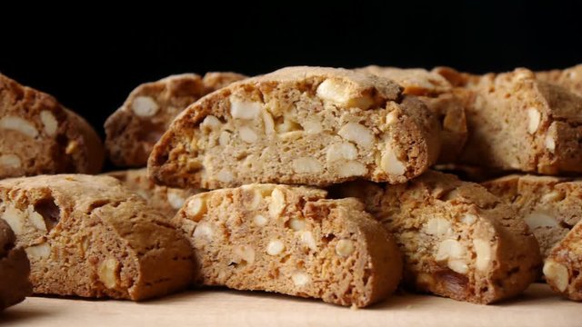 Panorama Of Nut Cookies Cantucci On The Black Background. Close Up.