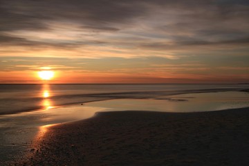 Fototapeta na wymiar Sunrise on the beach in Arenales del Sol, Alicante