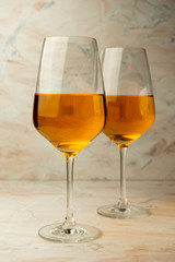 tall glass of rich orange wine