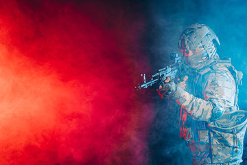 safety and protection concept. young man work as military man protecting country, wearing military...