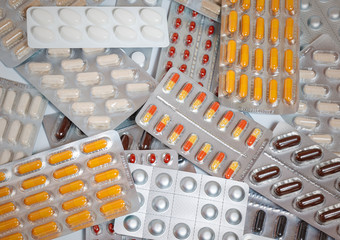 Pharmacy background on white. Pills. Medicine and healthy. Close up of capsules. Different kind of...