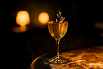 Close-up of an alcohol drink on a darkened backround