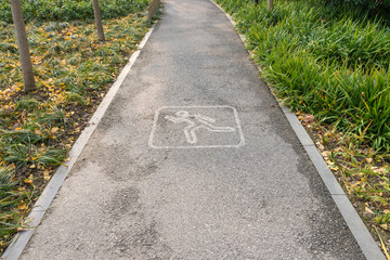 Obraz premium jogging / running lane way symbol in shanghai Park, shanghai city, china