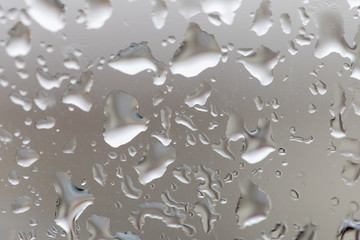 wet glass background. Natural pattern of droplets