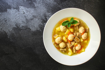 soup meatballs (poultry, chicken, turkey, vegetables) menu concept. food background. top view. copy space