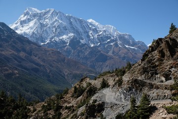 Amazing view of Annapurna range on trail from Ghyaru to Mananag, Himalaya, Nepal. During trekking around Annapurna, Annapurna Circuit.