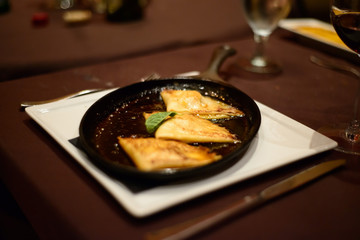 Ready-to-eat gourmet meal served on a cast iron skillet