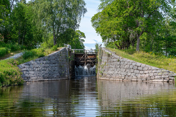 Summer view of the entrance to a boat canal i Sweden