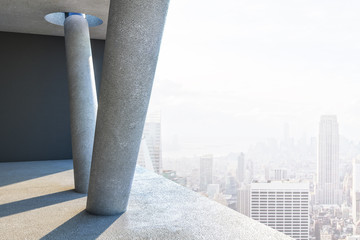 Clean concrete interior with columns