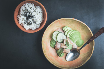 Vegan tofu poke bowl with avocado
