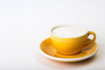 yellow cup on a white background