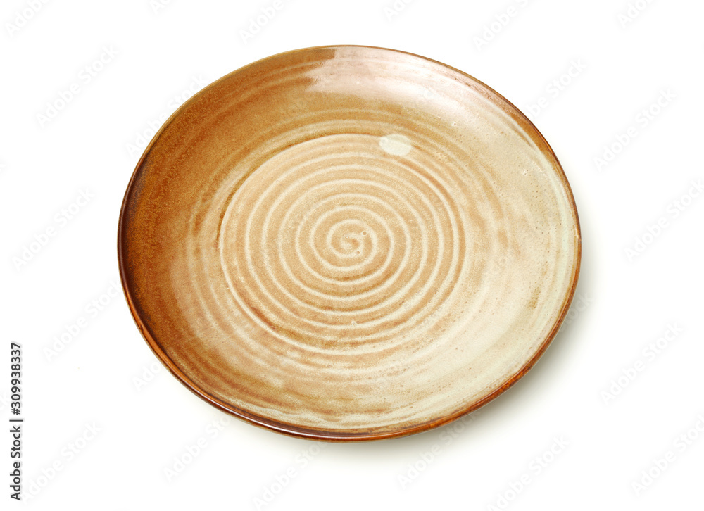 Wall mural Empty earthenware plate on white background