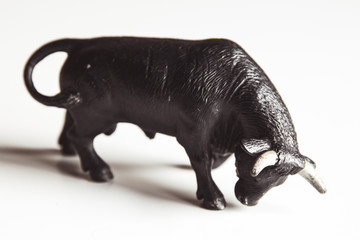 Spanish souvenir black bull toy from bull fighting isolated over white background