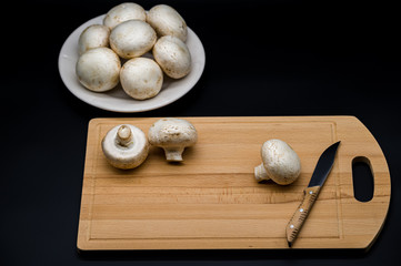 mushrooms on a chopping board