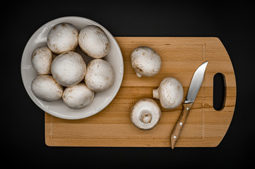 mushrooms on a cutting board