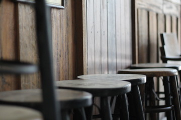 The chairs are arranged in a corridor within the school building.