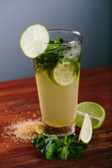 Mojito cocktail with lime and mint in glass 