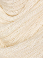 Knitted fabric natural beige wool cozy texture