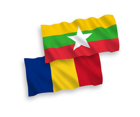 Flags of Romania and Myanmar on a white background
