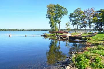 Russia, Karelia. Boats on the shore of lake Onega