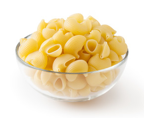 Uncooked pipe rigate pasta in glass bowl isolated on white background with clipping path