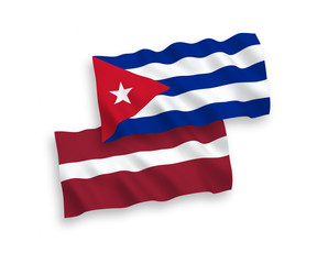 Flags of Latvia and Cuba on a white background