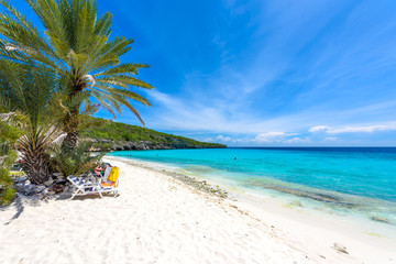 Cas Abao beach - paradise white sand Beach with blue sky and crystal clear blue water in Curacao, Netherlands Antilles, a Caribbean tropical Island