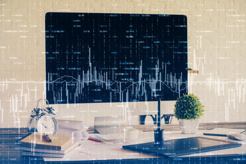 Financial chart drawing and table with computer on background. Multi exposure. Concept of international markets.