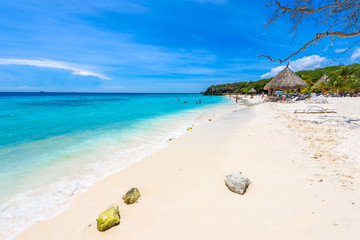 Cas Abao beach - paradise white sand Beach with blue sky and crystal clear blue water in Curacao, Netherlands Antilles, a Caribbean tropical Island