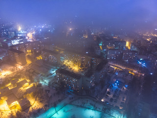 The city Chisinau in winter, at night with lights. Aerial view