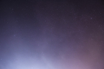 The night sky full of stars. Beautiful view from the roof of the house.