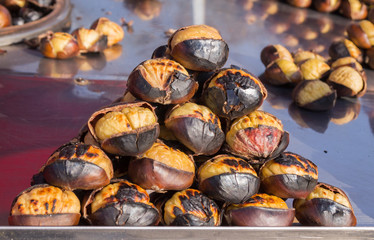 roasted chestnuts on the counter outside