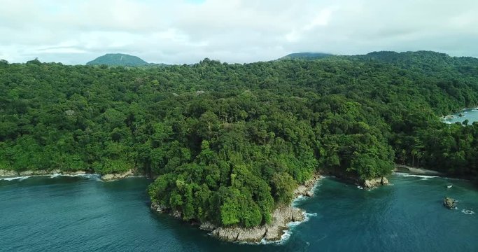 Cinematic aerial shot of the Coastline and the Tropical Jungle on a Natural reserve in the Colombian acific region of Choc&oacute;. 4k drone. 
