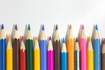 Colorful wooden pencils isolated on white background