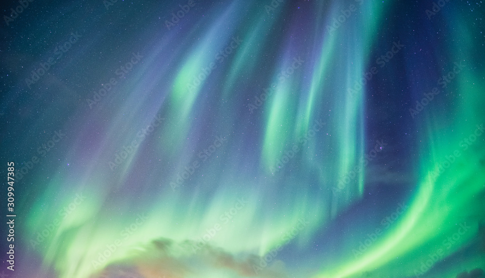 Wall mural northern lights, aurora borealis with starry in the night sky