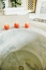 candles near font for baptism