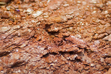 artistic nature - colorful layered soil full of iron