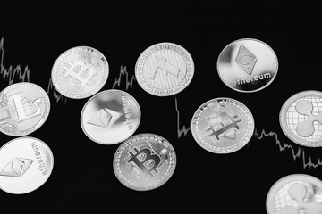 Bitcoin on a black and white background. Cryptocurrency trading. 