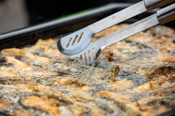 Obraz premium Delicious carp fillets roasted in the frying pan