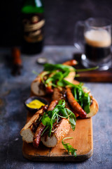 Cumberland sausage hot dogs with beery onions..style rustic