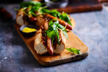 Cumberland sausage hot dogs with beery onions..style rustic