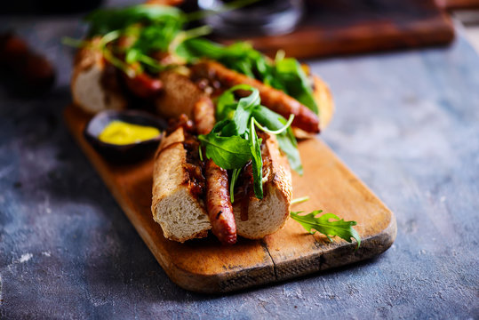 Cumberland sausage hot dogs with beery onions..style rustic