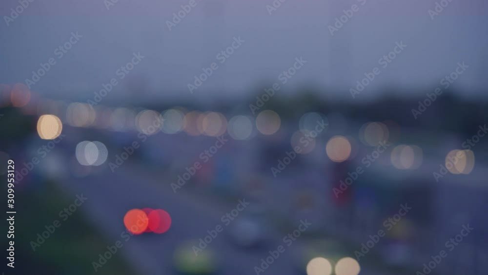 Poster footage motion blurred of bokeh light with transport car on express way road.